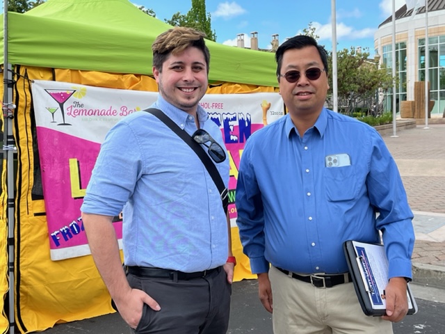 Tom Wong with James Peters at Hayward farmers market